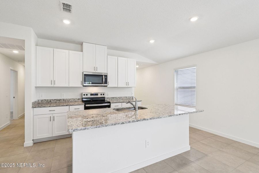 Furnished interior view inside a new home in Kings Crossing, Jacksonville (Image 10). Furnished interior view inside a new home in Kings Crossing, Jacksonville (Image 10).