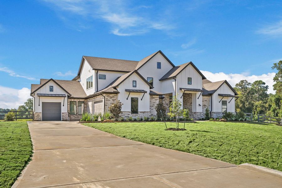 Front exterior of a new home in Bentwood Farms, Montgomery, TX, highlighting curb appeal (Image 28).