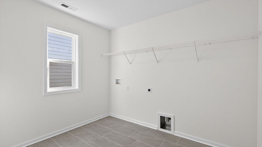 Representative unfurnished interior of a home built from the Hampshire by D.R. Horton in Kalas Falls, Wake Forest (Image 29).