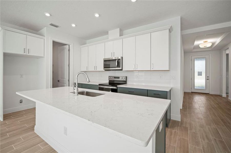Furnished interior view inside a new home in Fieldstone, Plant City (Image 3). Furnished interior view inside a new home in Fieldstone, Plant City (Image 3).