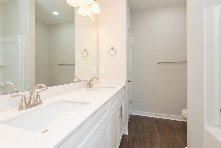 Representative furnished interior of a home built from the Lincoln by Foundation Home Builders LLC in Pinnix Loop, Burlington (Image 7).