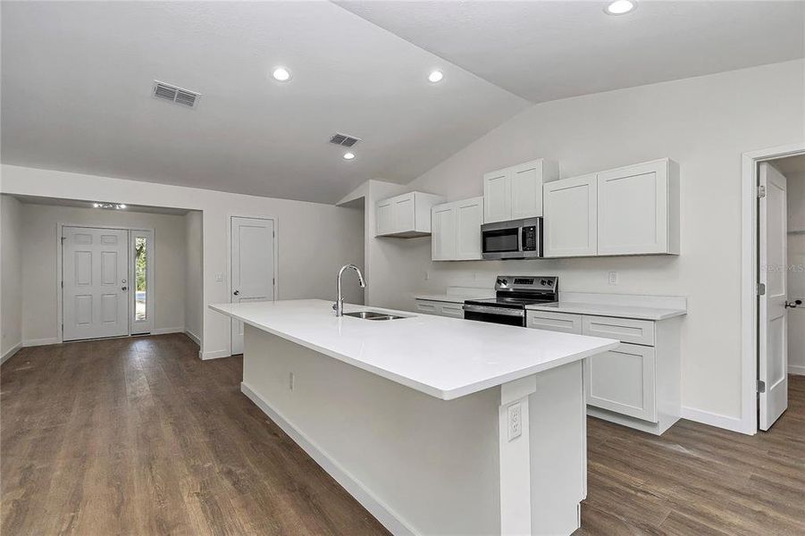 Furnished interior view inside a new home in , Dunnellon (Image 9).