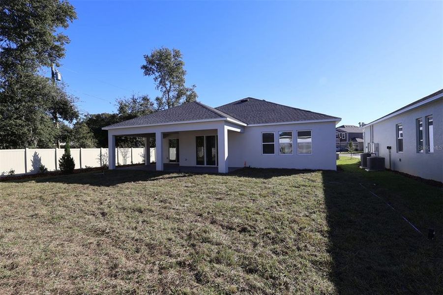 Exterior details and patio area of a home in Emerson Pointe, Apopka (Image 18).