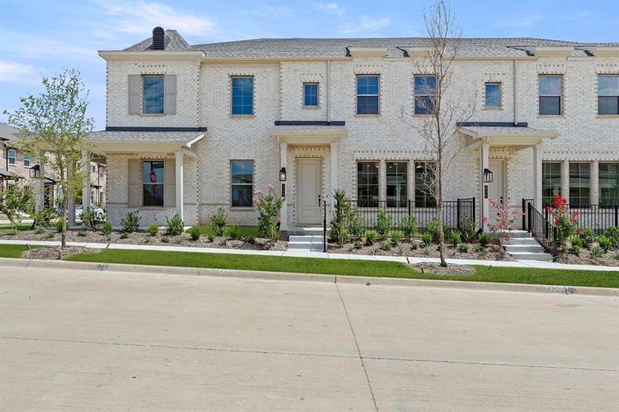 Front exterior of a new home in Parkside, Mansfield, TX, highlighting curb appeal (Image 2). Front exterior of a new home in Parkside, Mansfield, TX, highlighting curb appeal (Image 2).