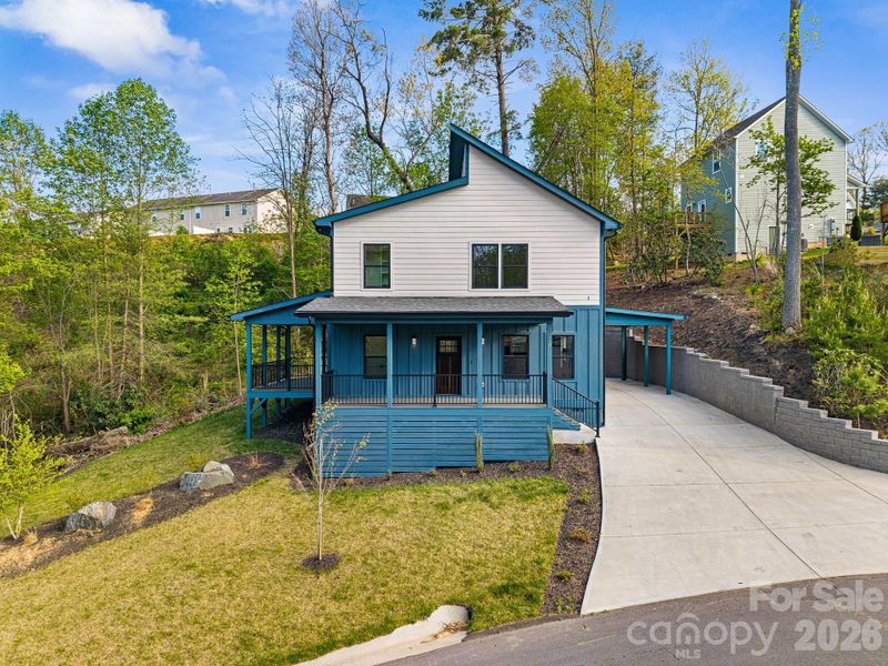 Front exterior of a new home in , Arden, NC, highlighting curb appeal (Image 27).