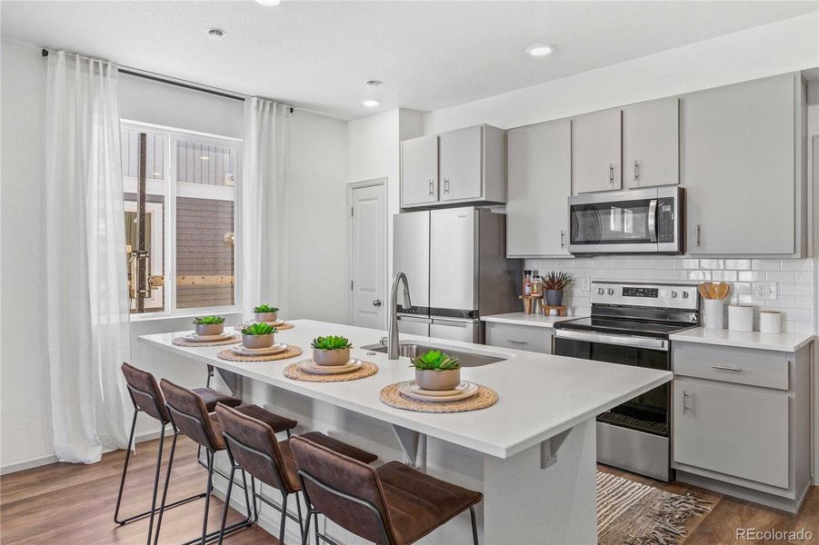 Furnished interior view inside a new home in Green Valley Ranch, Aurora (Image 9).