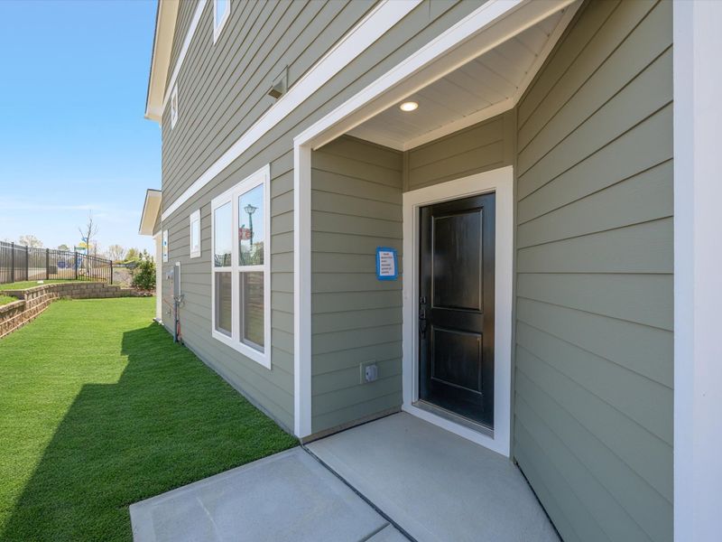 Exterior details and patio area of a home in Westview Towns, Waxhaw (Image 4). Exterior details and patio area of a home in Westview Towns, Waxhaw (Image 4).