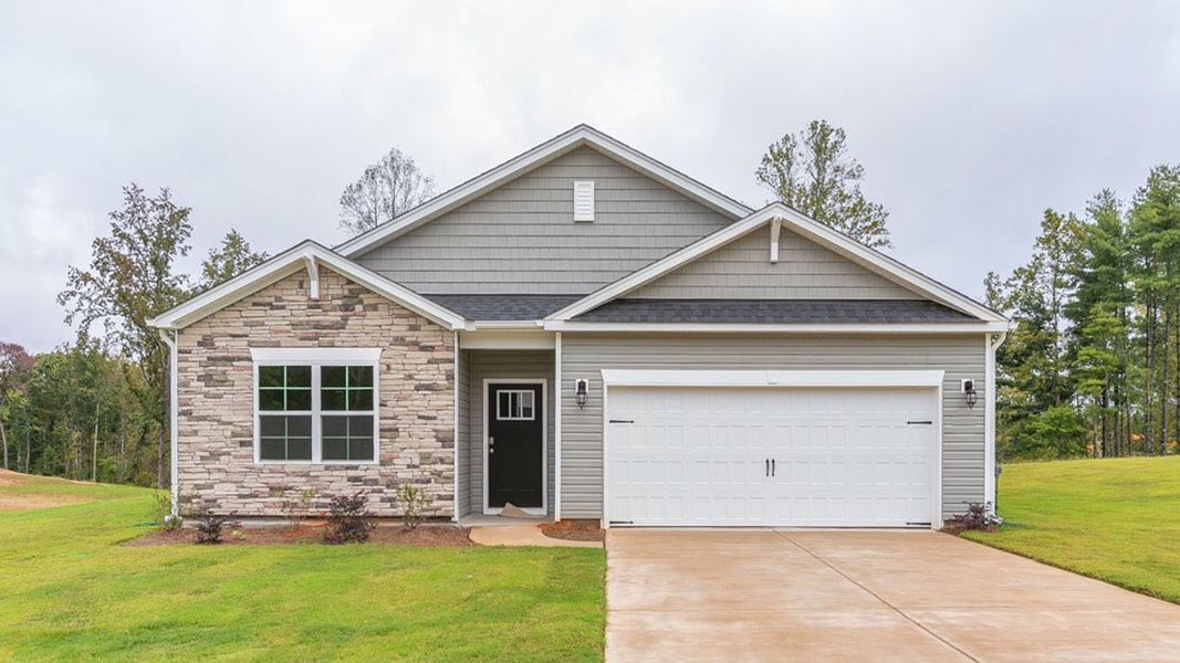 Front exterior of a new home in Bryson Park, Lexington, NC, highlighting curb appeal (Image 1). Front exterior of a new home in Bryson Park, Lexington, NC, highlighting curb appeal (Image 1).