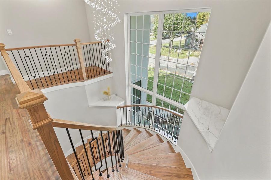 Staircase with wood finished floors and baseboards Staircase with wood finished floors and baseboards
