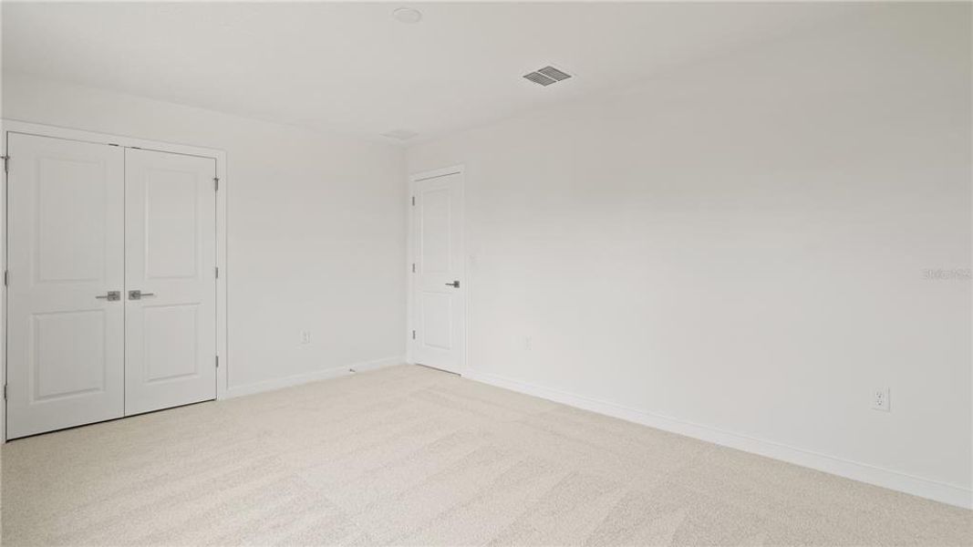 Spacious, unfurnished interior of a new home in Willowbrook North, Winter Haven (Image 22).