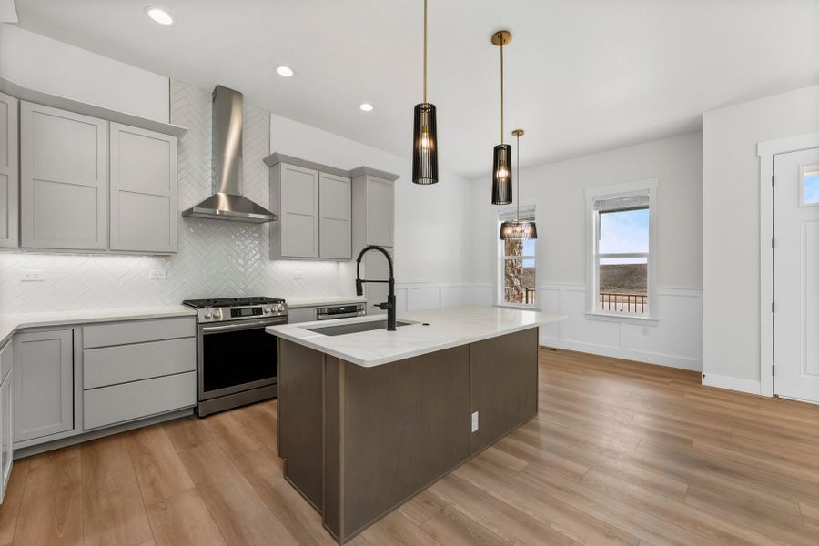 Representative furnished interior of a home built from the The Duxbury by Landmark Homes in Vernazza, Windsor (Image 5).