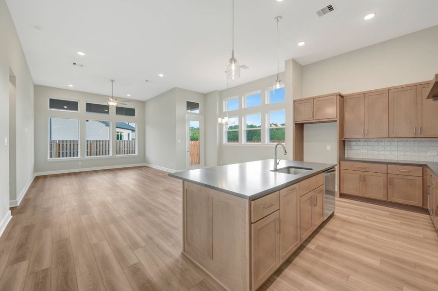 Furnished interior view inside a new home in COLTON - Reserve Collection, Todd Mission (Image 6).