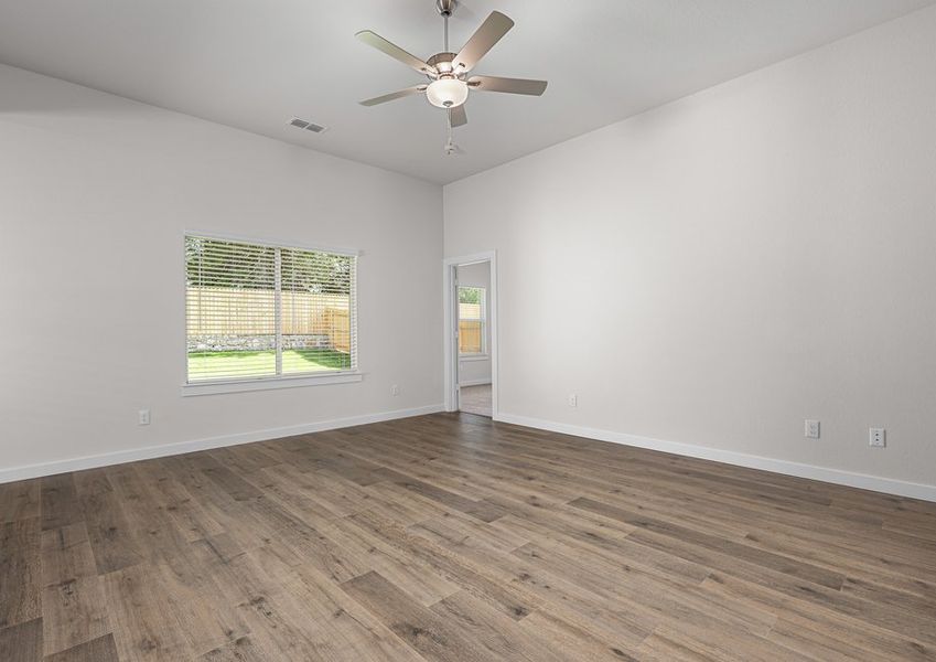 The living room has a large window that lets in great, natural light.