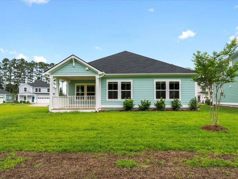 Exterior details and patio area of a home in The Coves at Lakes of Cane Bay, Summerville (Image 22).