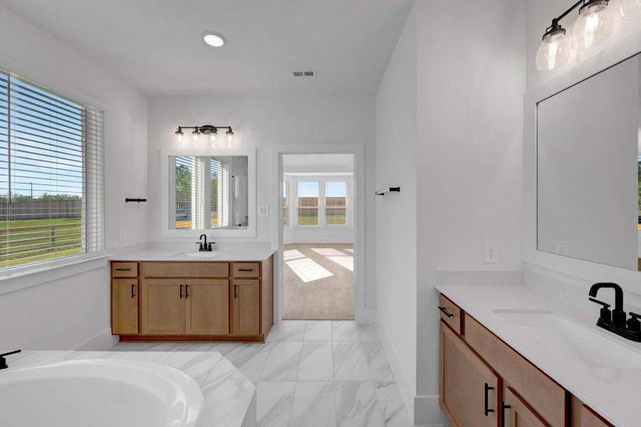 Furnished interior view inside a new home in Lone Star Landing, Montgomery (Image 12).