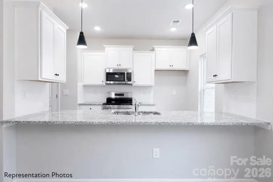 Furnished interior view inside a new home in , Charlotte (Image 7).