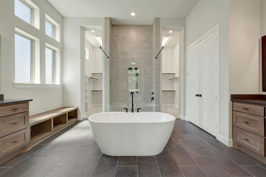 Bathroom with vanity, tiled shower, a closet, recessed lighting, and a freestanding bath