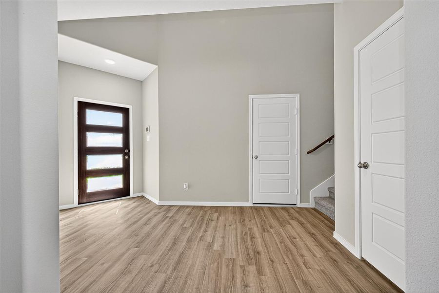 Spacious, unfurnished interior of a new home in Sunterra, Katy (Image 18).