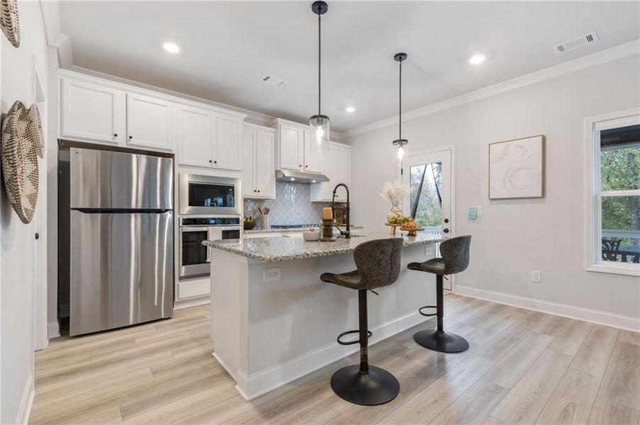 Furnished interior view inside a new home in , Auburn (Image 6).