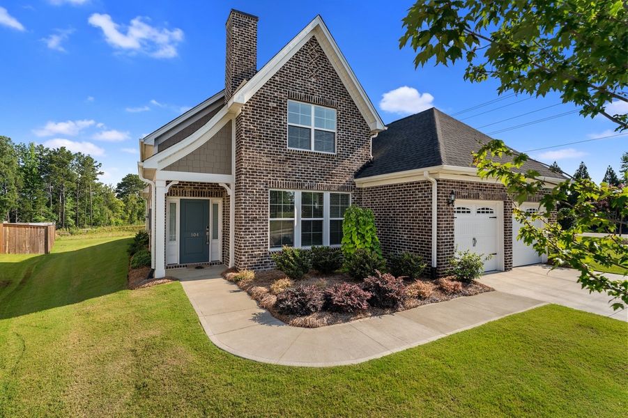 Front exterior of a new home in Taylor Oaks, Greenville, SC, highlighting curb appeal (Image 2). Front exterior of a new home in Taylor Oaks, Greenville, SC, highlighting curb appeal (Image 2).