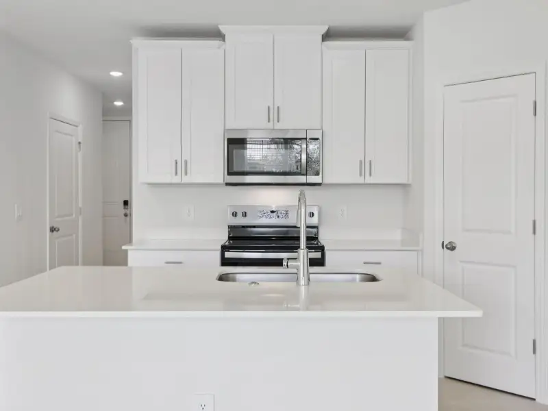 Furnished interior view inside a new home in Cagan Crossings West, Clermont (Image 3).