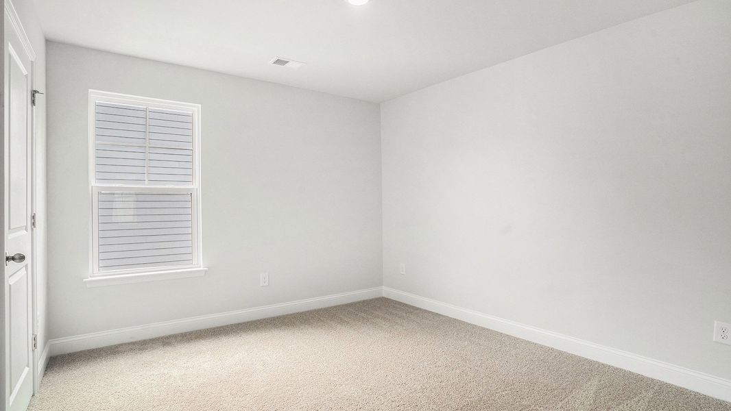 Spacious, unfurnished interior of a new home in The Preserve at Shaftesbury Glen, Conway (Image 8).