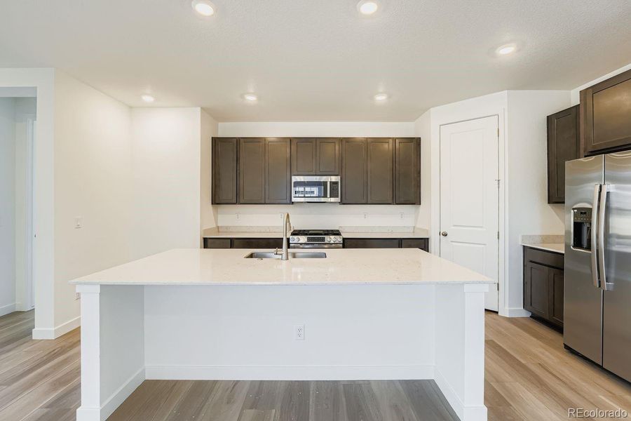Furnished interior view inside a new home in Ken-Caryl Ranch: The Monarch Collection, Littleton (Image 5).