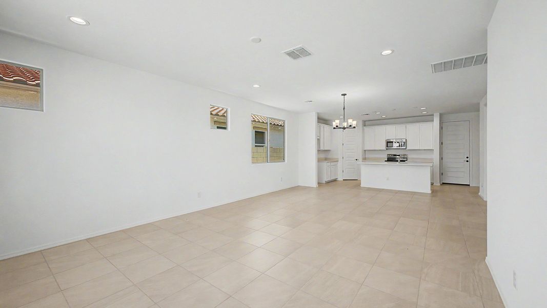 Representative furnished interior of a home built from the Acacia II by DRB Homes in Apache Farms, Buckeye (Image 7).