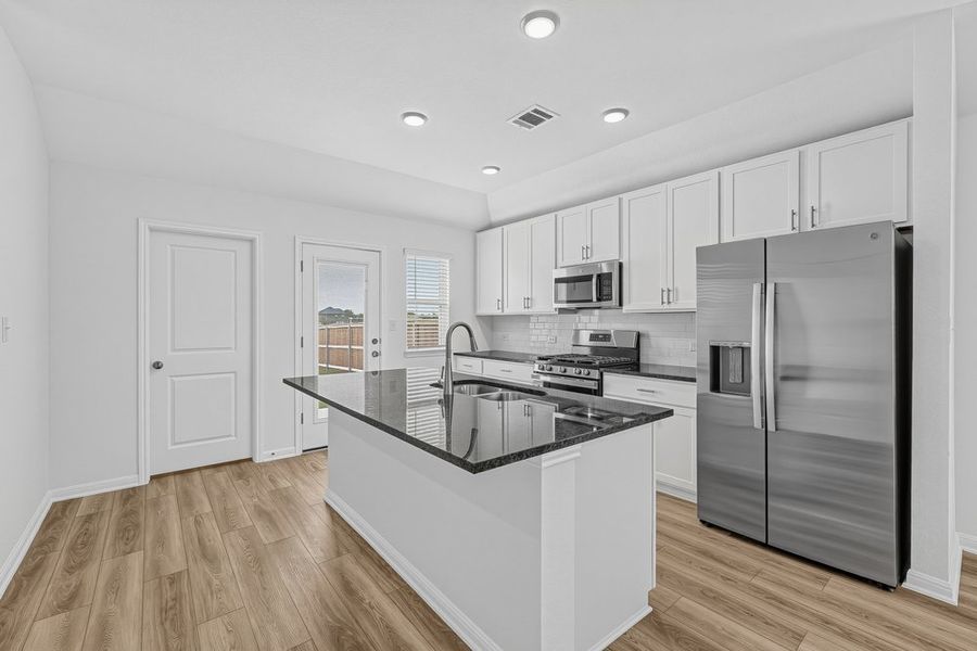 Representative furnished interior of a home built from the Capercaillie by Taylor Morrison in Emory Crossing, Hutto (Image 4).