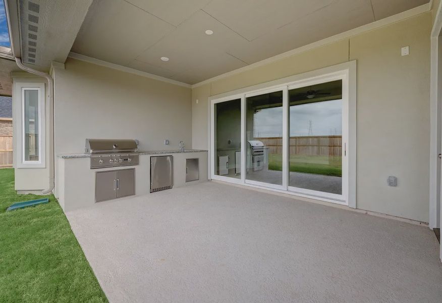 Plan 6025 patio w/ SS doors, outdoor kitchen - 12 of 21 Plan 6025 patio w/ SS doors, outdoor kitchen - 12 of 21