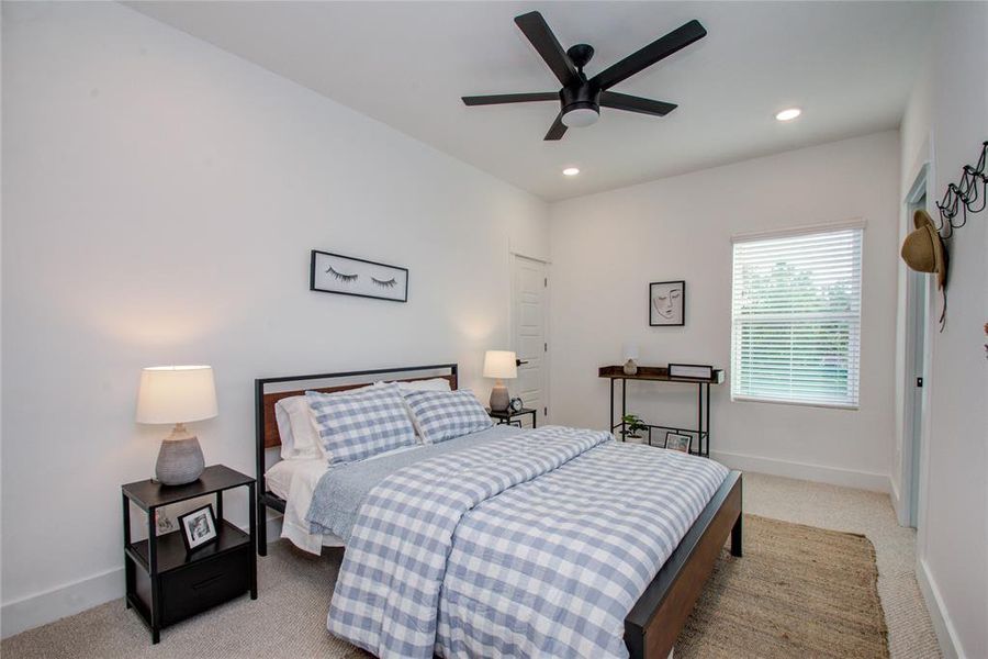 Secondary bedroom located on the second floor with a walk-in closet. Model home photos, finishes and floor plan MAY VARY! Ceiling fans are NOT INCLUDED!