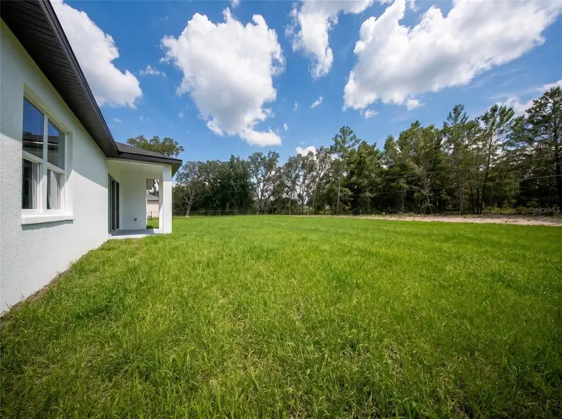Exterior details and patio area of a home in , Ocala (Image 3). Exterior details and patio area of a home in , Ocala (Image 3).