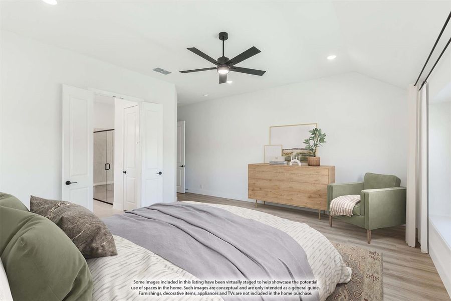 Bedroom with ceiling fan, wood dresser, ensuite bathroom door, and light hardwood floors