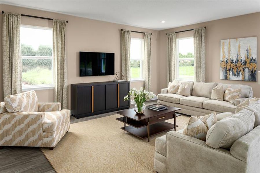 Representative furnished interior of a home built from the Rochelle by Ryan Homes in Bellaviva, Auburndale (Image 7).