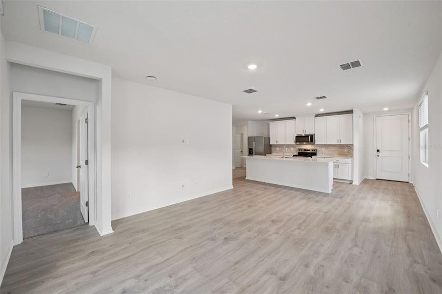 Spacious, unfurnished interior of a new home in Ridgehaven - Villas, Ormond Beach (Image 17).