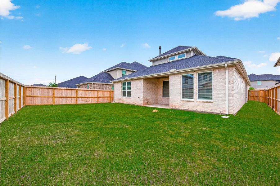 Exterior details and patio area of a home in Harvest Green, Richmond (Image 29).