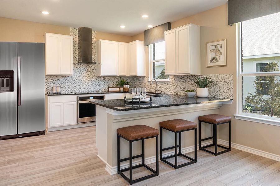 Representative furnished interior of a home built from the 2245 by KB Home in Hidden Canyons at TRP, San Antonio (Image 7).