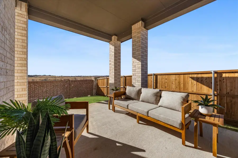 Exterior details and patio area of a home in Brookshire at Legacy Hills, Celina (Image 2).