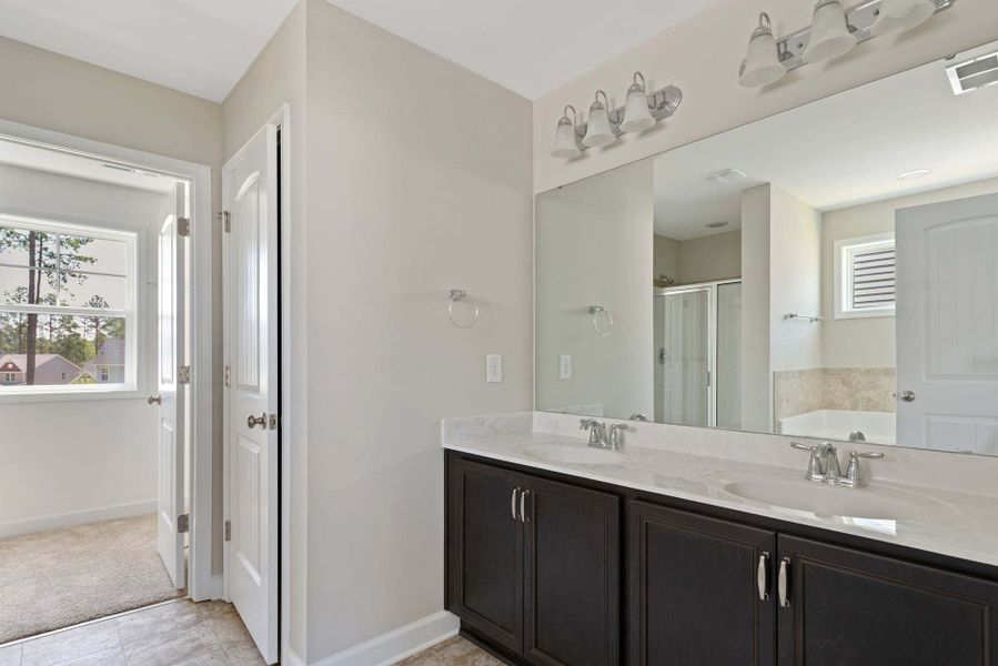 Representative furnished interior of a home built from the Brunswick by Caviness & Cates Communities in Maggie Way, Wendell (Image 217). Representative furnished interior of a home built from the Brunswick by Caviness & Cates Communities in Maggie Way, Wendell (Image 217).