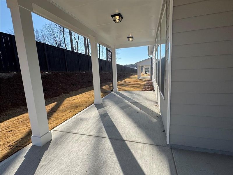 Exterior details and patio area of a home in Rosewood Lake Preserve, Hoschton (Image 3).