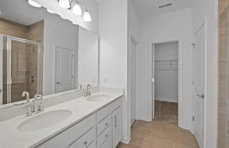 Furnished interior view inside a new home in Parkside Crossing, Charlotte (Image 28). Furnished interior view inside a new home in Parkside Crossing, Charlotte (Image 28).