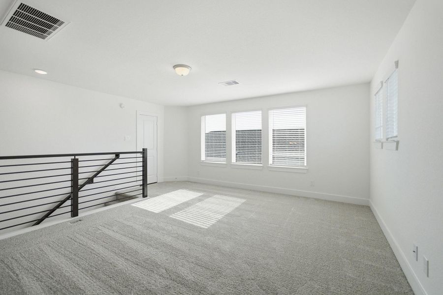 Spacious, unfurnished interior of a new home in Sunterra Lakes, Brookshire (Image 19).