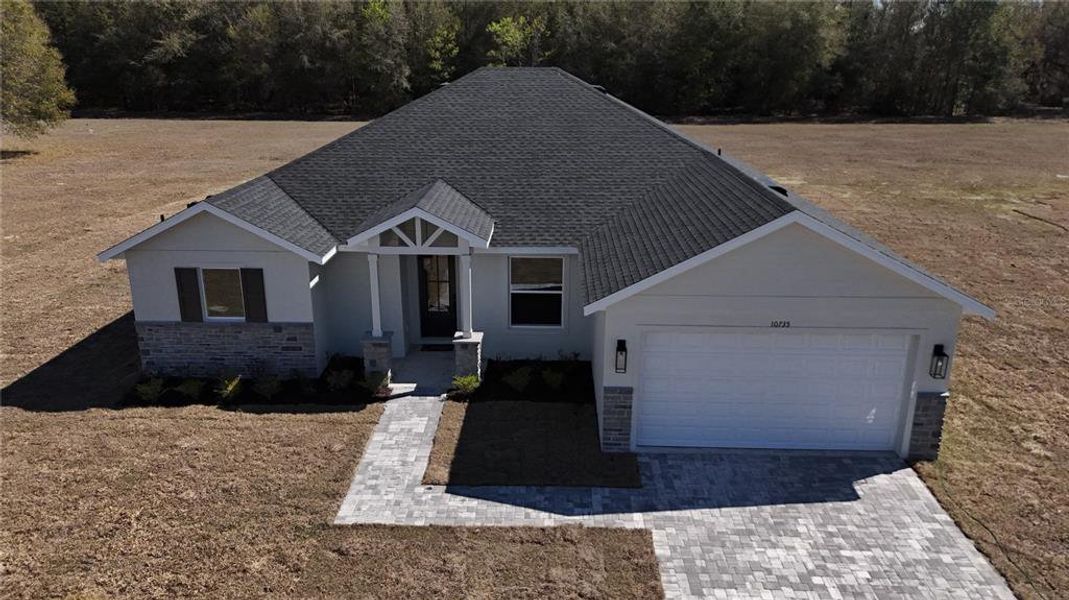 Front exterior of a new home in , Webster, FL, highlighting curb appeal (Image 14). Front exterior of a new home in , Webster, FL, highlighting curb appeal (Image 14).