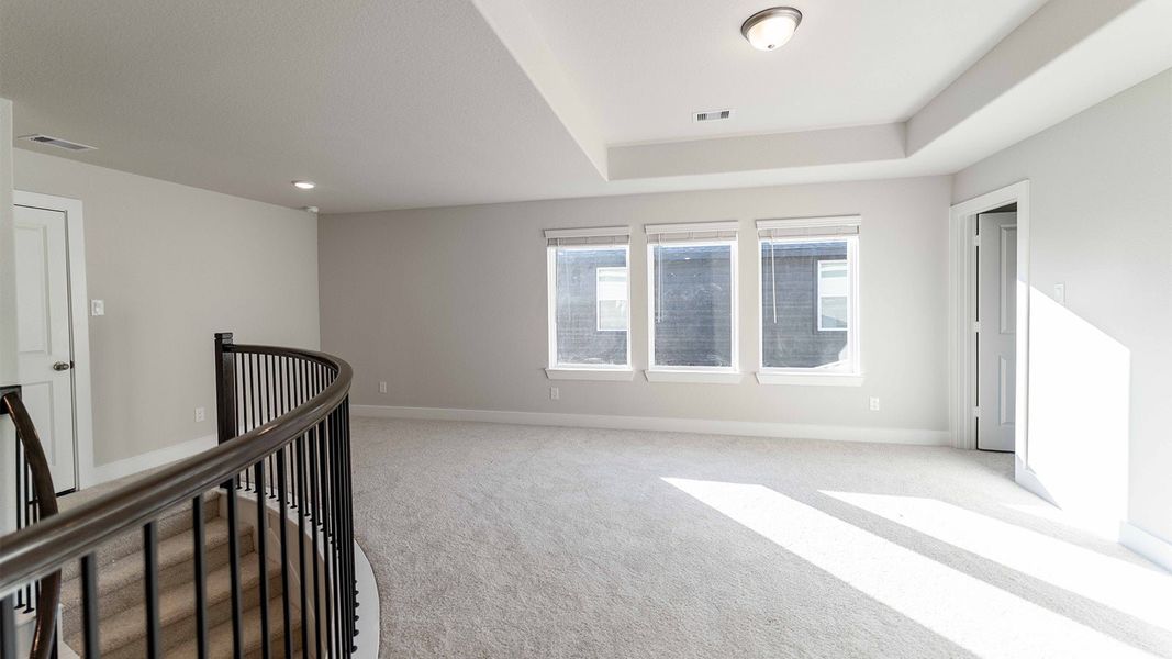 Spacious, unfurnished interior of a new home in Sunterra, Katy (Image 23).