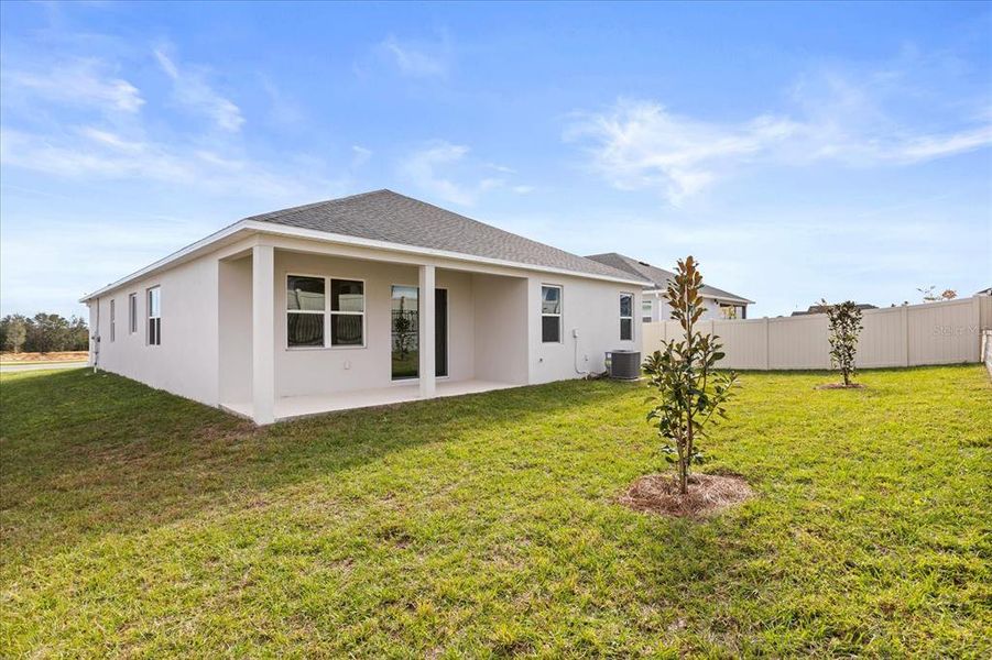 Exterior details and patio area of a home in , Groveland (Image 4).