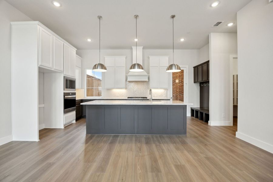 Furnished interior view inside a new home in Newman Village Townhomes, Frisco (Image 7).