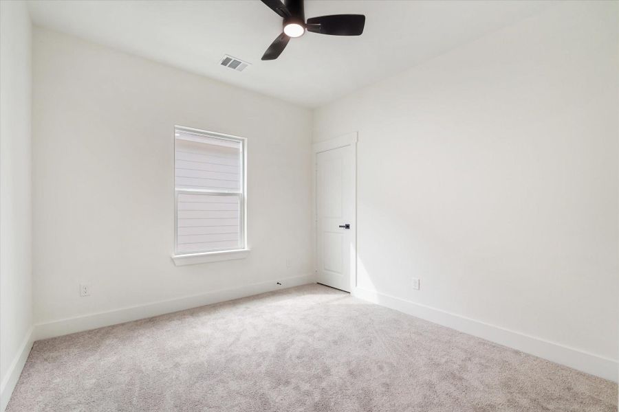 Two additional bedrooms include walk-in closets, ceiling fans, and soft carpet! Two additional bedrooms include walk-in closets, ceiling fans, and soft carpet!