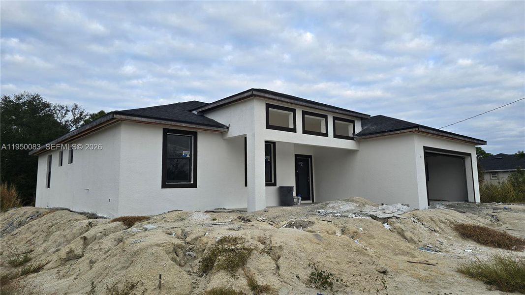 In-progress construction of a new home in , Lehigh Acres, FL (Image 16).