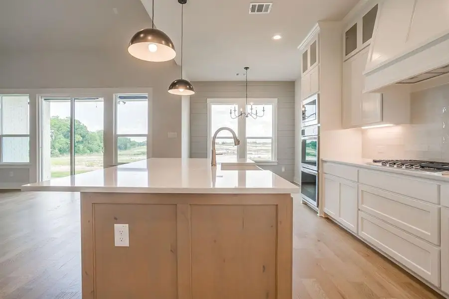 Furnished interior view inside a new home in Peaks at Lone Elm, Waxahachie (Image 10).