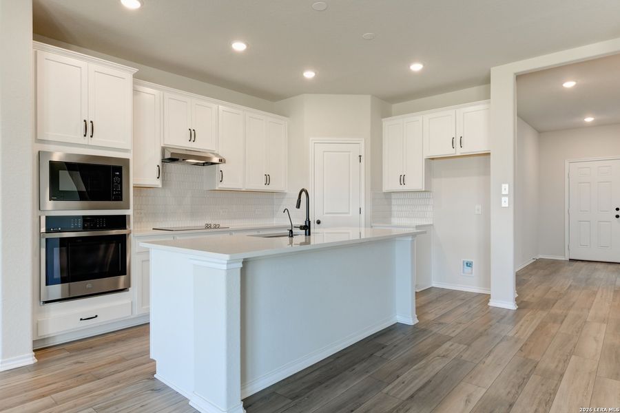 Furnished interior view inside a new home in Hennersby Hollow, San Antonio (Image 6).